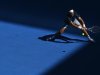 Juan Martin del Potro of Argentina hits a return to Jeremy Chardy of France during their men's singles match at the Australian Open tennis tournament in Melbourne