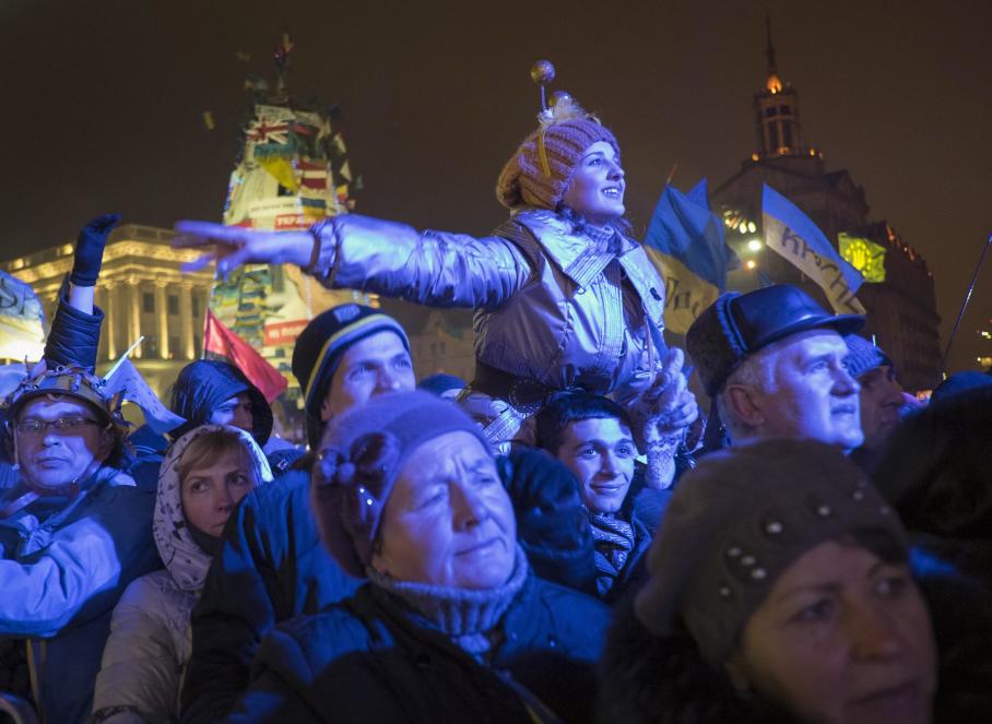 Pro-European integration supporters take part in New Year celebrations in Independence Square in central Kiev