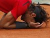 Nadal of Spain reacts after winning the men's singles final match against Djokovic of Serbia at the French Open tennis tournament at the Roland Garros stadium in Paris
