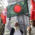 Members of Bangladesh Muktijoddha Sangsad shout slogans after a war crimes tribunal sentenced Azad to death in Dhaka
