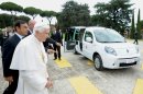 Pope Benedict XVI is presented with an electric car in Castel Gandolfo, in the outskirts of Rome, Wednesday, Sept. 5, 2012. The 85-year-old pontiff was presented with his first electric car on Wednesday, a customized white Renault Kangoo for jaunts around the gardens of the papal summer residence at Castel Gandolfo. Benedict has been dubbed the 