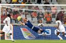 Libya's goalkeeper Muhammad Nashnoush saves a goal during the African Nations Championship final football match for 1st and 2nd place between Ghana and Libya, in Cape Town, on February 1, 2014