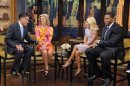 Handout of Republican presidential candidate Romney and his wife appear on the revamped syndicated talk show, "LIVE! with Kelly and Michael" as they are interviewed by hosts Ripa and Strahan in New York