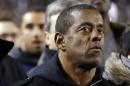 FILE - In this Nov. 9, 2013, file photo, former Pittsburgh and NFL Hall of Fame running back Tony Dorsett stands on the sideline before the start of an NCAA football game between Pittsburgh and Notre Dame in Pittsburgh. Dorsett is one of more than 4,500 former players that have filed suit, some accusing the NFL football league of fraud for its handling of concussions. A federal judge on Tuesday, Jan. 14, 2014, denied preliminary approval of a $765 million settlement of NFL concussion claims, fearing it may not be enough to cover 20,000 retired players. (AP Photo/Keith Srakocic, File)