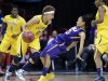 California's Layshia Clarendon, left, drives against LSU's Adrienne Webb in the first half of a regional semifinal game in the NCAA women's college basketball tournament Saturday, March 30, 2013, in Spokane, Wash. (AP Photo/Elaine Thompson)