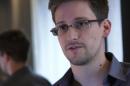 This still frame grab recorded on June 6, 2013 and released to AFP on June 10, 2013 shows Edward Snowden during an interview with The Guardian newspaper at an undisclosed location in Hong Kong