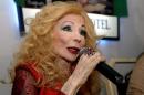 In this Nov. 2011 photo, famous Lebanese singer Sabah speaks to journalists during her birthday in Beirut, Lebanon. Lebanon's official news agency says beloved Lebanese singer and entertainer Sabah has died at the age of 87. (AP Photo/Ahmad Omar)