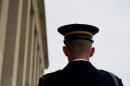 A member of a military honor guard awaits an honor cordon ceremony at the Pentagon for meetings in Washington, DC, September 23, 2013