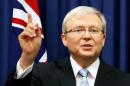 File photo of Australia's former PM Kevin Rudd gesturing at a news conference in Brisbane