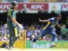 Sri Lanka's Nuwan Kulasekara celebrates the dismissal of Australia's Moises Henriques during their one-day international cricket match in Brisbane