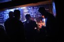 Foreigners stand at the bar area as they have a drink at The Shelter nightclub, a former bomb shelter in Xuhui district, Shanghai June 2, 2012.