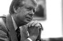 FILE - In this Jan. 24, 1977 file photo, President Jimmy Carter is interviewed in the Oval Office of the White House in Washington. Republican presidential candidate Donald Trump has alarmed U.S. allies in Asia and elsewhere by suggesting that American military support should depend on their willingness to pay. But he would not be the first U.S. president to consider shaking up time-honored military deployments. Four decades ago, then-President Carter tried to withdraw American troops in South Korea, and failed. He wanted to trim fat from the U.S. defense budget and put pressure on South Korea over human rights abuses, but hit a wall of opposition in his own administration and in Seoul. (AP Photo, File)
