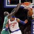 Boston Celtics forward Kevin Garnett (5) dunks against New York Knicks forward Carmelo Anthony (7) in the first half of their NBA basketball game at Madison Square Garden in New York, Monday, Jan. 7, 2013. (AP Photo/Kathy Willens)