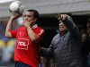 Independiente's coach Gallego talks to Morel Rodriguez during their Argentine First Division soccer match against Boca Juniors in Buenos Aires