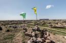 File photo of Kurdish YPG flags in Tel Hamis in Hasaka countryside after YPG took control of the area