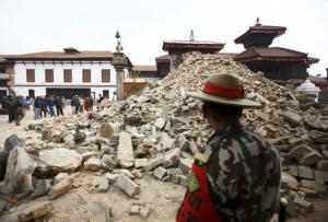 Desperate Nepalese sleep in open as aftershocks spread fear.