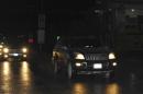 A convoy believed to be carrying newly-released nuns, who were held by rebels in Syria, drives to the Masnaa border crossing