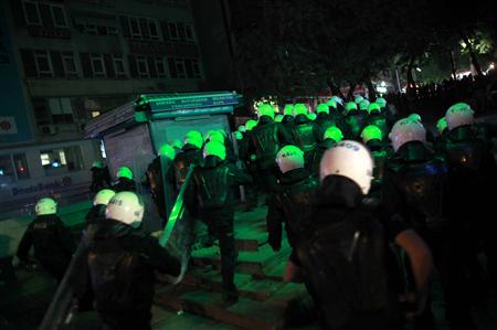 Riot policemen chase protesters at Kizilay Square in central Ankara, June 9, 2013. REUTERS/Dado Ruvic
