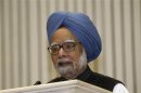 India's PM Singh speaks during the meeting of the 57th NDC in New Delhi
