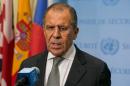 Russia Foreign Minister Sergey Lavrov speaks to the media after a meeting concerning Syria with US Secretary of State John Kerry at the United Nations headquarters in New York on September 30, 2015