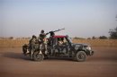 Malian soldiers patrol the streets of Gao