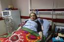 Barakzai speaks during an interview at a hospitalafter having survived an attack on November, in Kabul