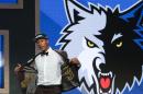 Kris Dunn reacts as he steps up on stage after being selected fifth overall by the Minnesota Timberwolves during the NBA basketball draft, Thursday, June 23, 2016, in New York. (AP Photo/Frank Franklin II)
