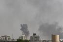 Smoke billows from the site of Saudi-led air strikes on al-Dailami air base in Sanaa