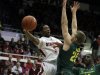 Stanford's Chasson Randle, left, looks to pass away from Oregon's E.J. Singler during the first half of an NCAA college basketball game Wednesday, Jan. 30, 2013, in Stanford, Calif. (AP Photo/Ben Margot)