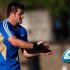 Richie McCaw of New Zealand's All Blacks passes the ball during a training session ahead of their Rugby Championship match against Argentina in Quilmes