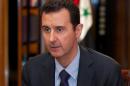 A handout picture released by the official Syrian Arab News Agency (SANA) on October 21, 2013, shows President Bashar al-Assad giving an interview to Lebanese channel al-Mayadeen in Damascus