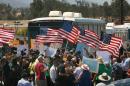Protesters turn back three buses