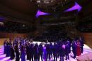 About 1000 high school students sing "Purple Rain" to honor the late singer Prince at Walt Disney Concert Hall which is illuminated purple in Downtown Los Angeles