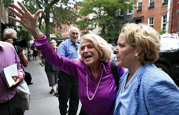 Edith Windsor (in purple) reacts to cheers in New York (REUTERS/Mike Sega)