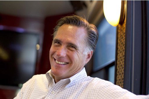 In this June 8, 2012, photo, Republican presidential candidate, former Massachusetts Gov. Mitt Romney smiles has he talks with his staff while riding on his bus after a campaign stop in Council Bluffs, Iowa. Republicans riding high from a string of breaks in their favor are increasingly optimistic about Romney’s chances to claim the White House in November, even among conservatives who had qualms about making him the party’s nominee. The bullish take is reflected in interviews with party strategists and activists, including people who supported Romney rivals during the primary season. Mood matters because it can fuel fundraising and volunteer hustle. But some of those GOP players stress that Romney has little room for error if he expects to topple an incumbent president. (AP Photo/Evan Vucci)