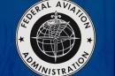 The Federal Aviation Administration bans all US civilian flights over Iraq, just hours after air strikes ordered by Washington on Islamist fighters