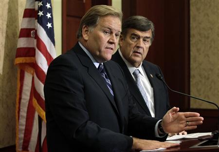 House Intelligence Committee Chairman Mike Rogers (R-MI) (L) and Rep. Dutch Ruppersberger (D-MD) hold a news conference to release a report on "national security threats posed by Chinese telecommunications companies Huawei and ZTE" on Capitol Hill in Washington October 8, 2012. REUTERS/Yuri Gripas
