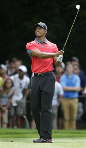 Column: Woods departs early, empty-handed again