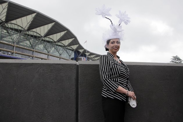 Racegoer Winnall poses for photographs on Ladies&#39; Day, the third day of racing at the Royal Ascot, southwest of London