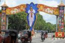 An archway with a portrait Sri Lankan President Mahinda Rajapakse is pictured in the capital Colombo, on November 11, 2013, a few days ahead of the Commonwealth summit