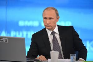 Russian President Vladimir Putin listens during an &hellip;