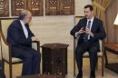 Syria's President Bashar al-Assad meets Iran's Foreign Minister Ali Akbar Salehi in Damascus