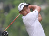 Lucas Lee of Brazil plays a shot on the third fairway during the third round of Thailand Open Golf Championship at Thana City Golf and Sports Club on the outskirts of Bangkok, Thailand Saturday, March 16, 2013. (AP Photo/Apichart Weerawong)