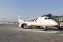 A Finnair airplane is docked at the Chopin International Airport in Warsaw