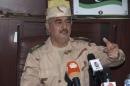Ex-general Khalifa Haftar speaks during a news conference after surviving an assassination attempt, in Al Marj