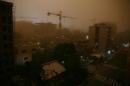 A view of Tehran, Iran, Monday, June 2, 2014, while a flash dust storm hits the Iranian capital. Iran's state TV is reporting that at least two people have been killed and 30 others injured after a heavy dust storm hit the capital Tehran with a speed of 110 kilometers per hour. (AP Photo/Ebrahim Noroozi)