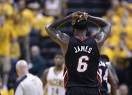 Miami Heat's LeBron James reacts after he was called for a technical foul during the first half against the Indiana Pacers in Game 4 of the NBA basketball Eastern Conference finals, Tuesday, May 28, 2013, in Indianapolis. (AP Photo/Michael Conroy)