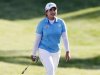 Inbee Park of South Korea smiles as she is applauded by the crowd while walking to her ball on the 17th green during the third round of the Kraft Nabisco Championship LPGA golf tournament in Rancho Mirage, California