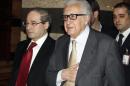 United Nations Envoy Lakhdar Brahimi returns to a hotel after meeting Syria's President Bashar al-Assad in Damascus