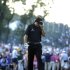Phil Mickelson reacts after missing a shot on the 18th hole during the fourth round of the U.S. Open golf tournament at Merion Golf Club, Sunday, June 16, 2013, in Ardmore, Pa. (AP Photo/Morry Gash)